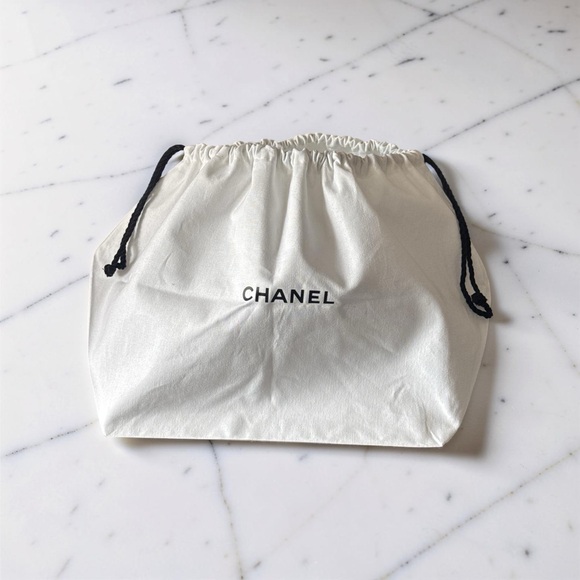 CHANEL Handbags - Authentic CHANEL Cotton Drawstring Pouch in White with Cream Tone